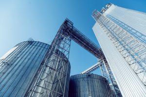 Modern silos for storing grain harvest. Agriculture. Background